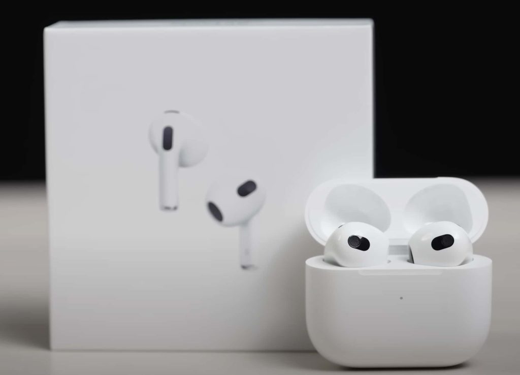 Close-up of Apple AirPods on a white background.